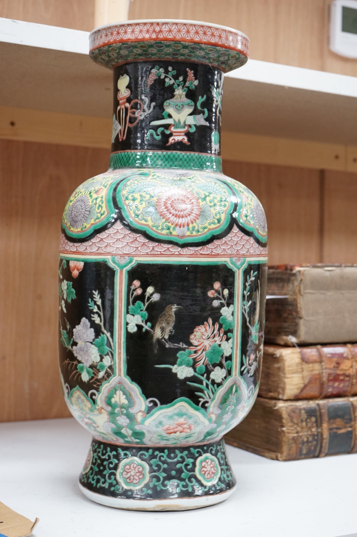 An early 20th century Chinese famille noir vase, 44.5cm. Condition - poor to fair